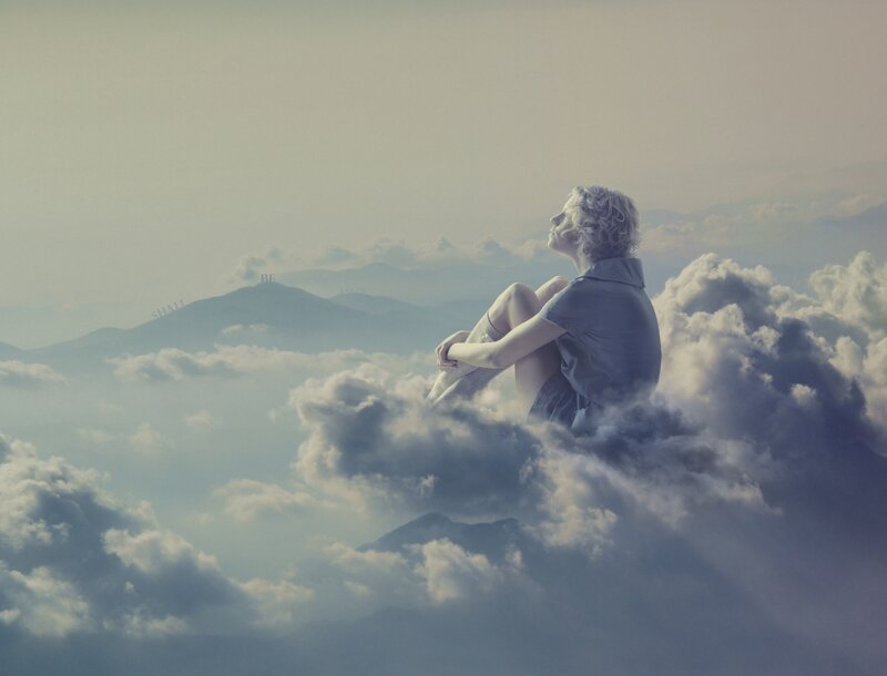Woman Sitting on Cloud