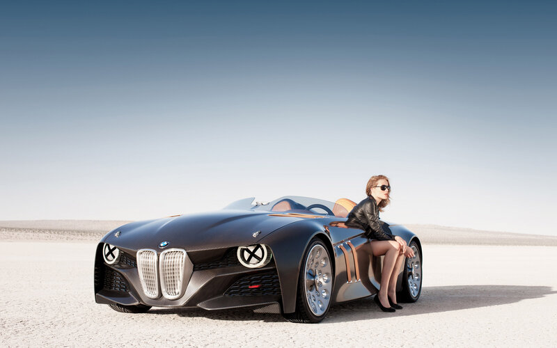 Woman Sitting on Concept Car — Black