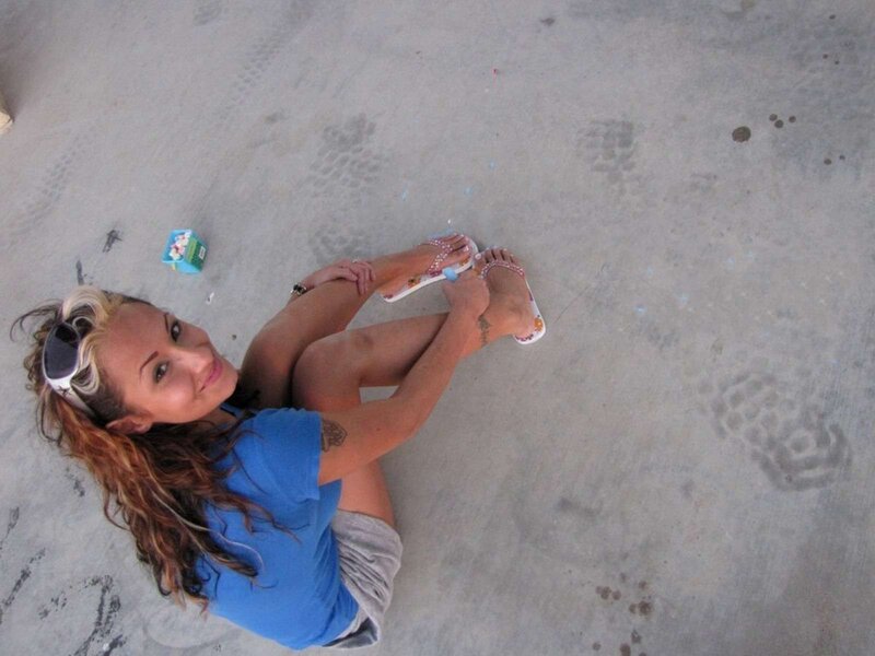 Woman Sitting on Concrete — Blue