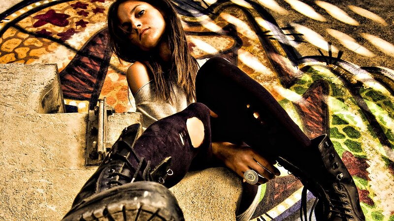 woman sitting on concrete steps