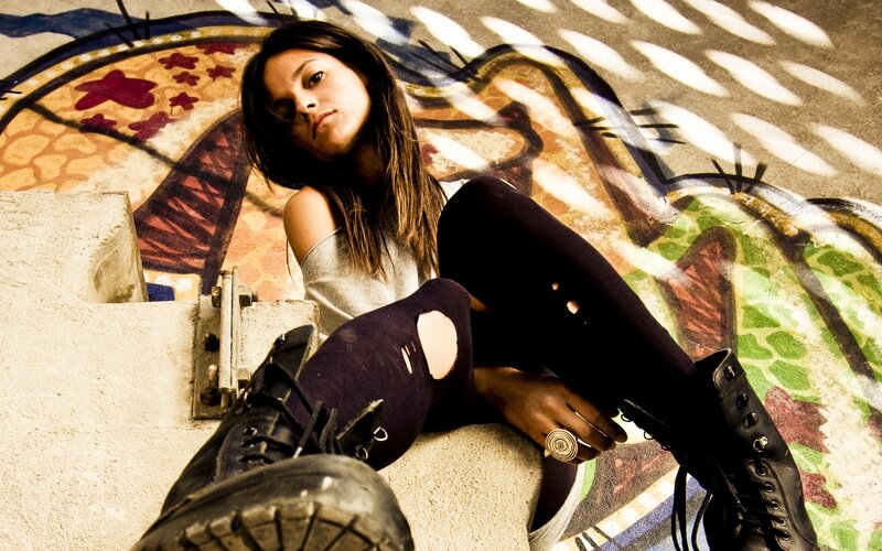 woman sitting on concrete steps