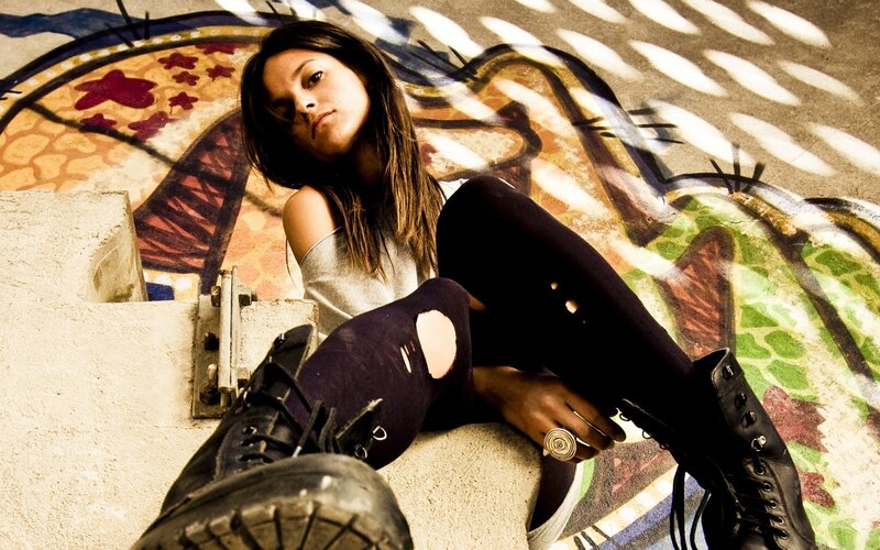 woman sitting on concrete steps