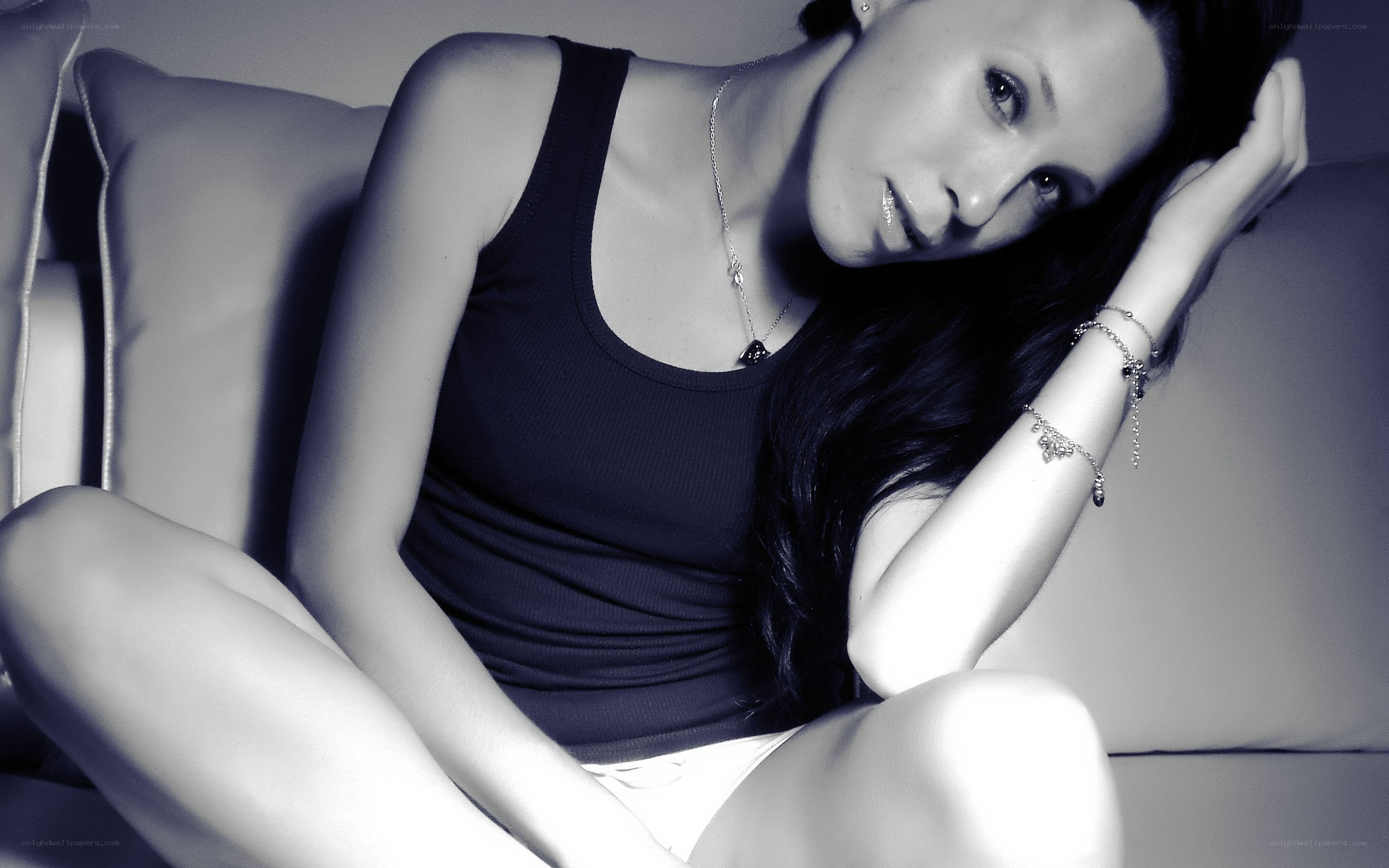 woman sitting on couch