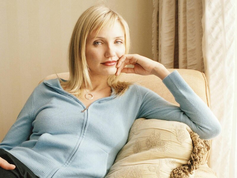 Woman Sitting on Couch — Blue, Relaxed, Afternoon