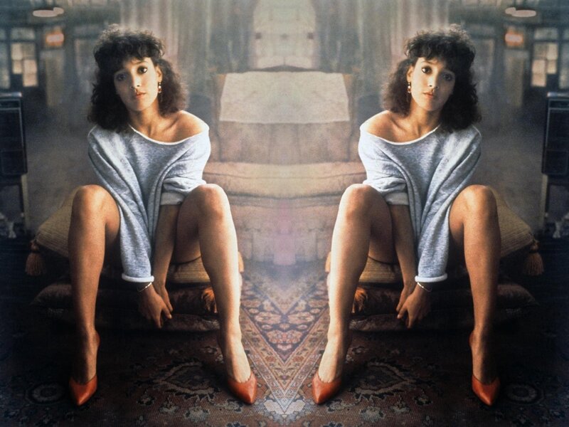 Woman Sitting on Couch — Gray, Dramatic