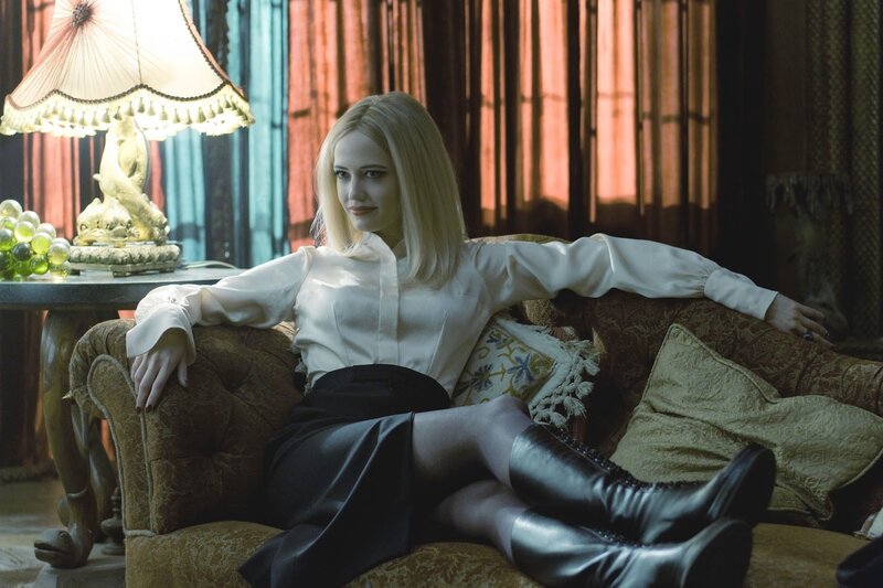 Woman Sitting on Couch — White, Dramatic