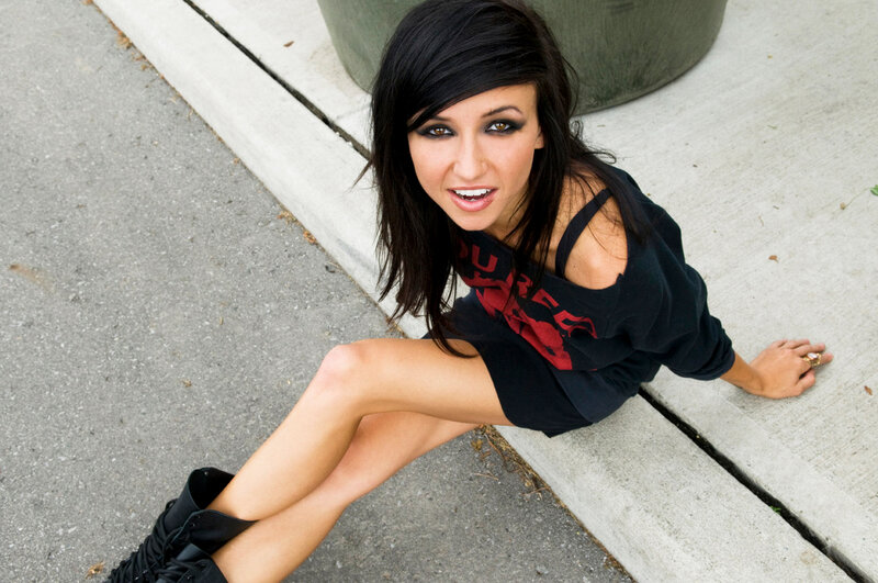 woman sitting on curb