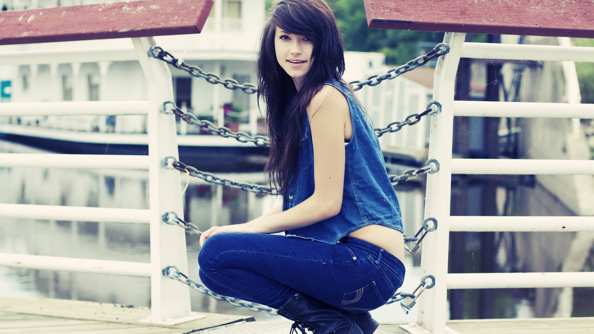 woman sitting on dock
