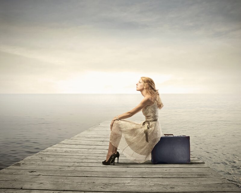 Woman Sitting on Dock — Gray, Serene