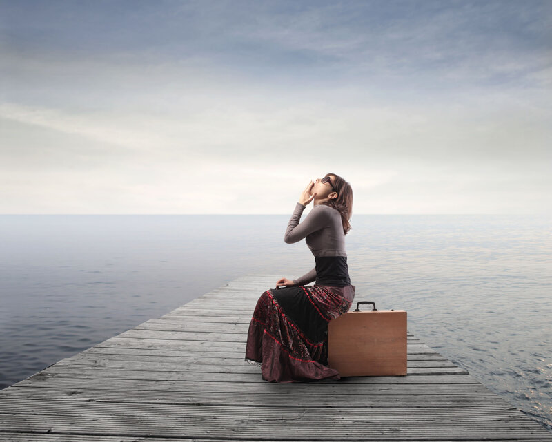 Woman Sitting on Dock — Gray