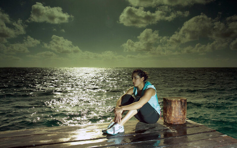Woman Sitting on Dock — Green