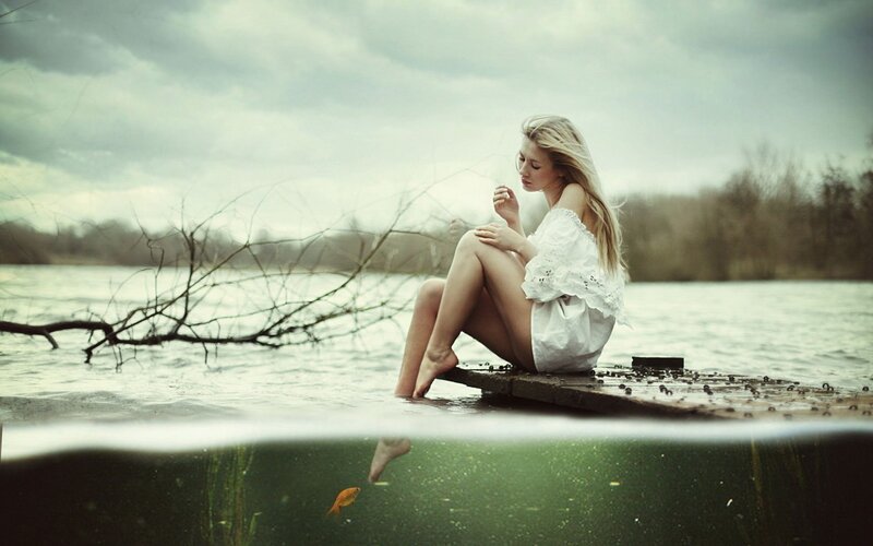Woman Sitting on Dock — White, Serene