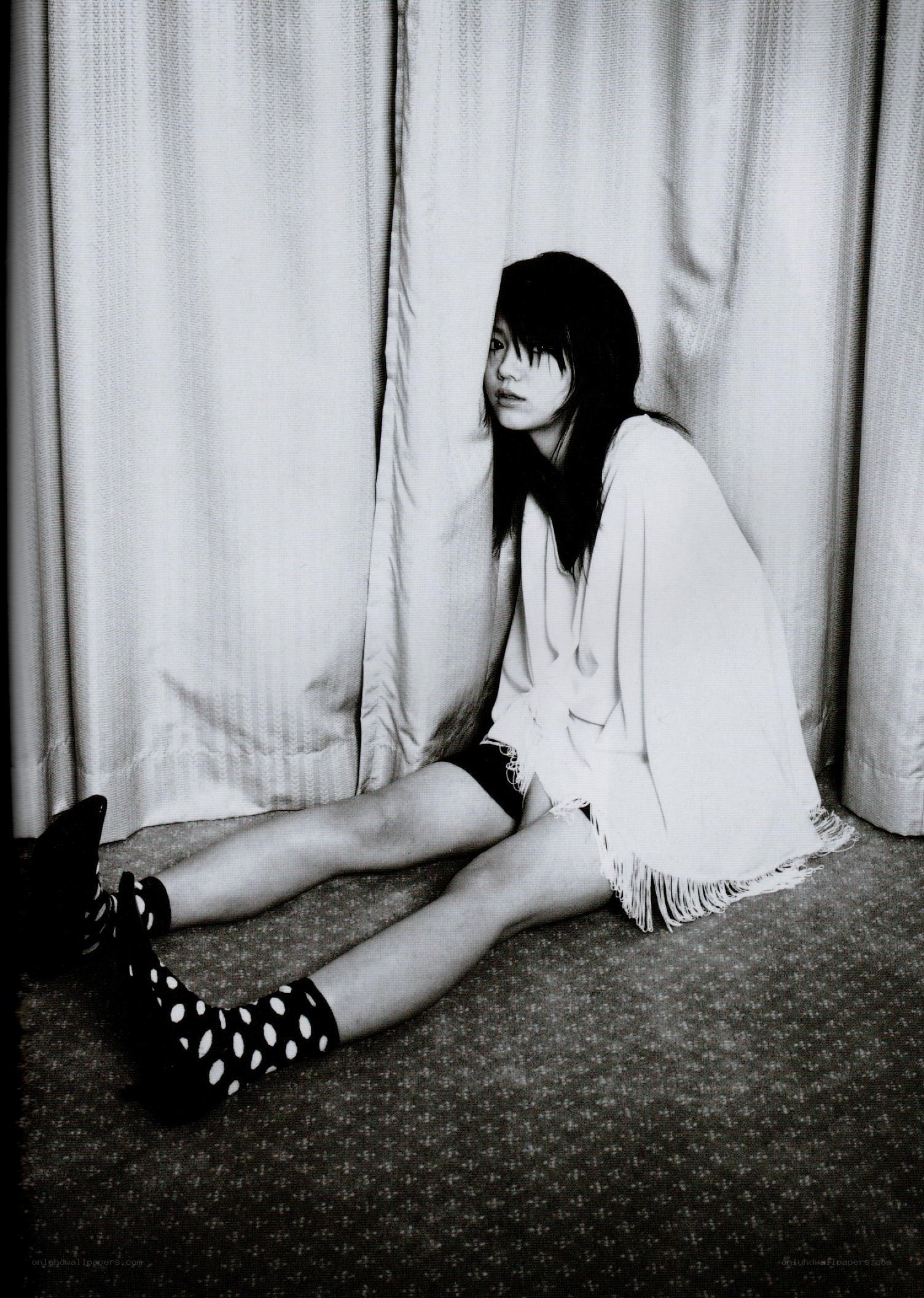 woman sitting on floor