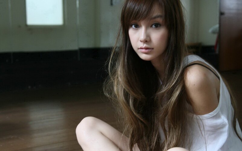 woman sitting on floor