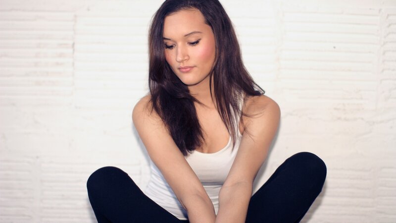 woman sitting on floor
