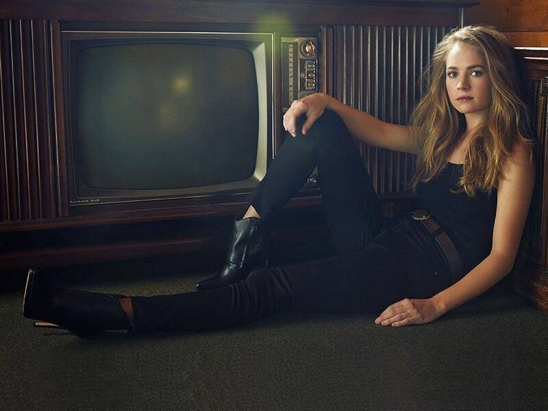 Woman Sitting on Floor — Black, Contemplative, Photograph, Television