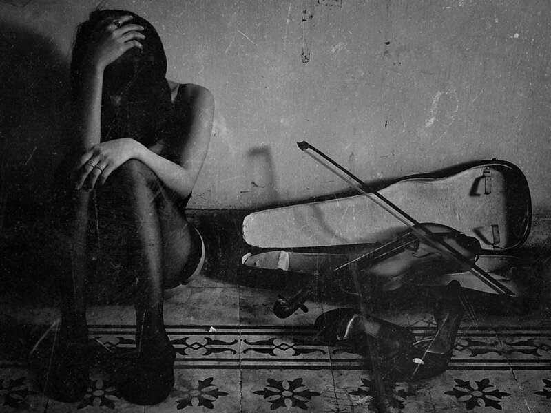 Woman Sitting on Floor — Black, Melancholic