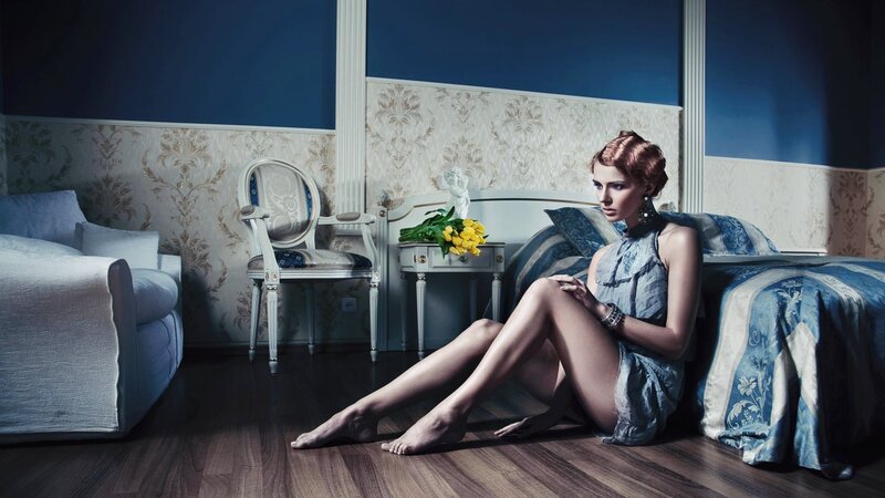 Woman Sitting on Floor — Blue, Dramatic, Photograph, Bed