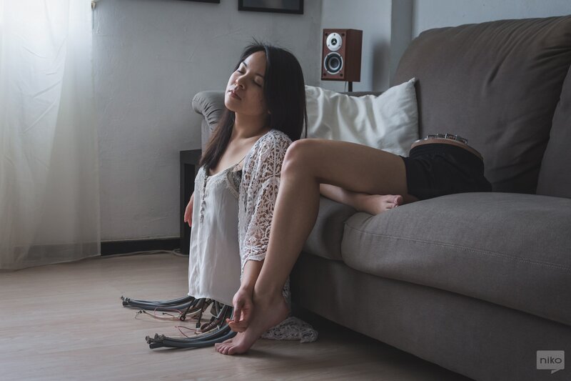 Woman Sitting on Floor — Gray, Calm, Photograph, Couch