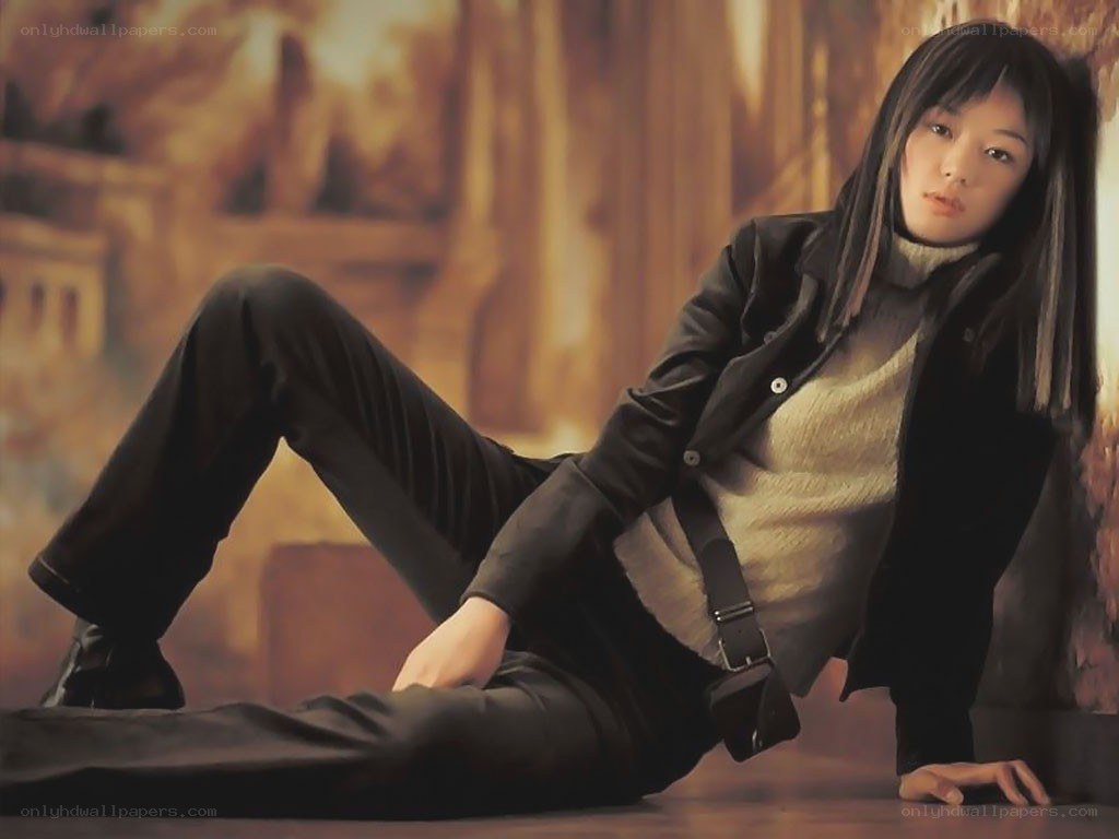 woman sitting on floor in jacket