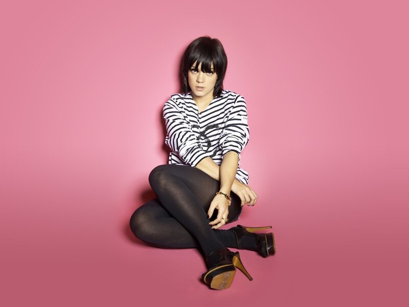 Woman Sitting on Floor — Pink, Confident, Photograph
