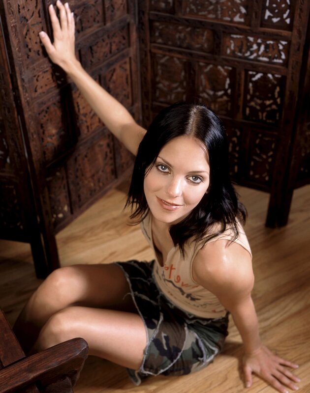 woman sitting on floor smiling