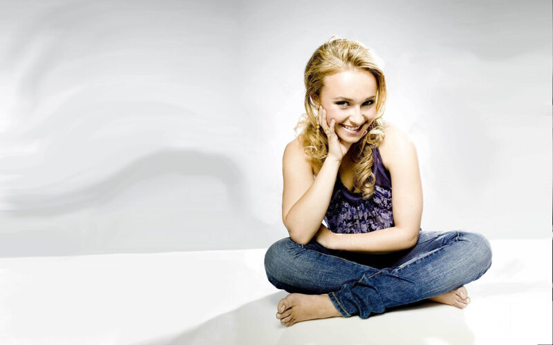 woman sitting on floor smiling