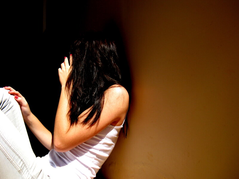 Woman Sitting on Floor — White, Dramatic, Afternoon