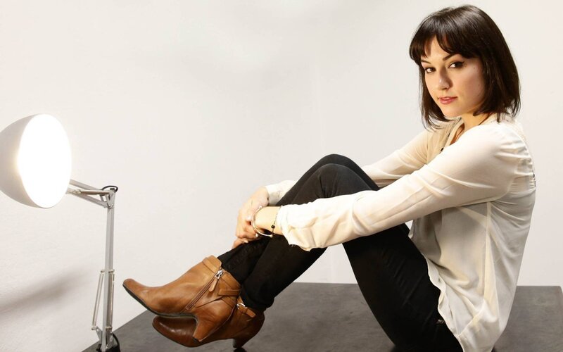 Woman Sitting on Floor — White, Neutral, Photograph, Lamp