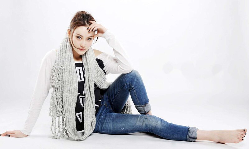 Woman Sitting on Floor — White, Neutral, Photograph, Scarf
