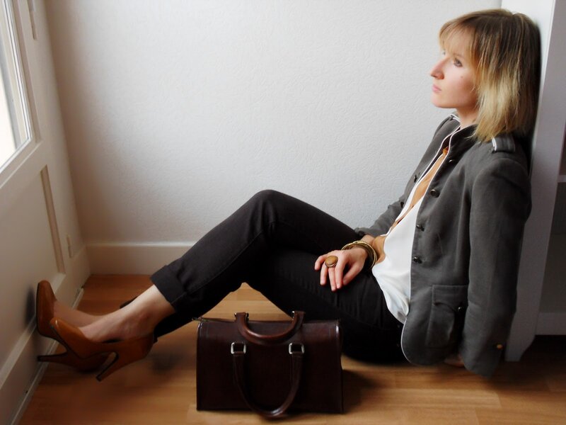 woman sitting on floor with bag