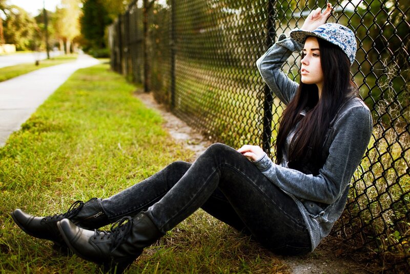 woman sitting on grass