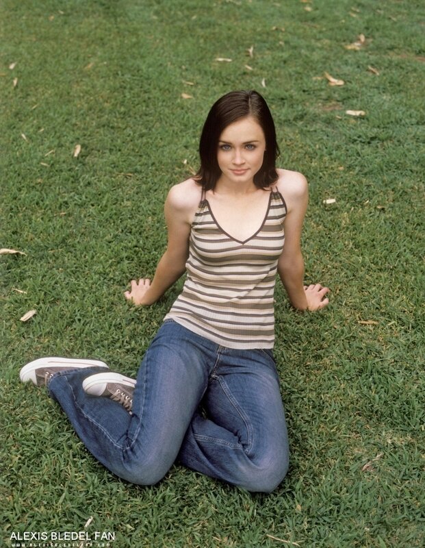 woman sitting on grass