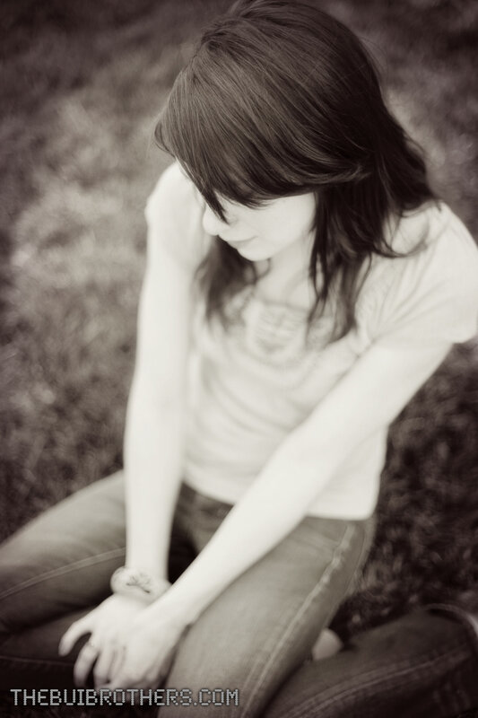 woman sitting on grass