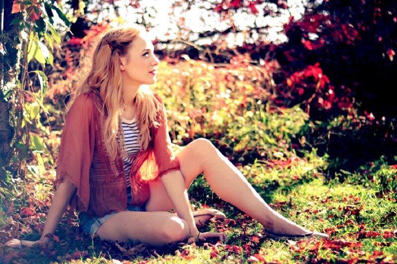 Woman Sitting on Grass — Green, Serene