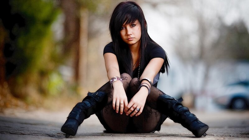 woman sitting on ground