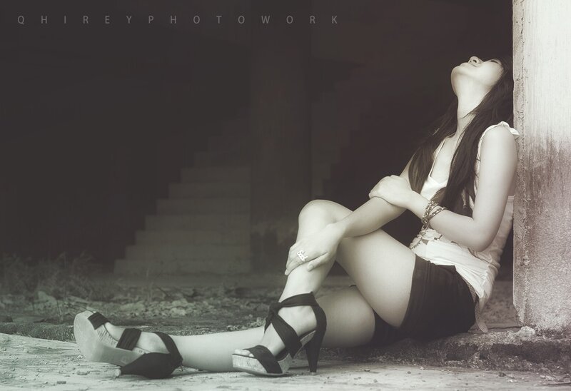 Woman Sitting on Ground — Black, Dramatic, Photograph, Wall