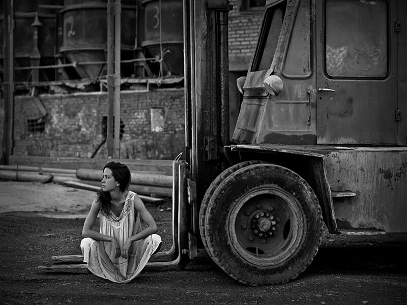 Woman Sitting on Ground — Black, Somber