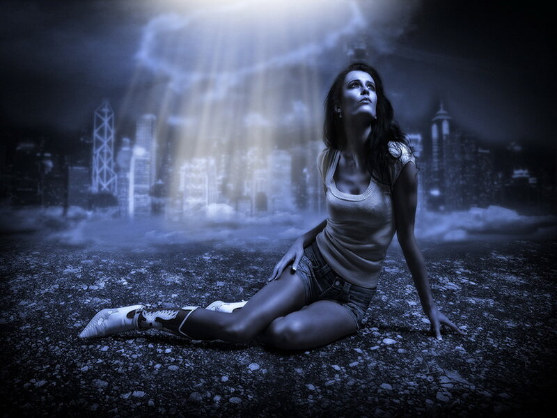Woman Sitting on Ground — Blue, Dramatic