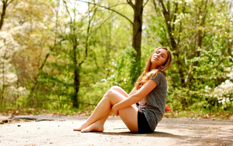 Woman Sitting on Ground — Green, Serene, Afternoon, Photograph