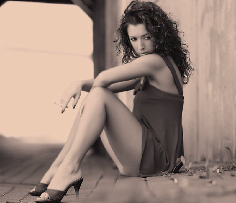 Woman Sitting on Ground — Sepia