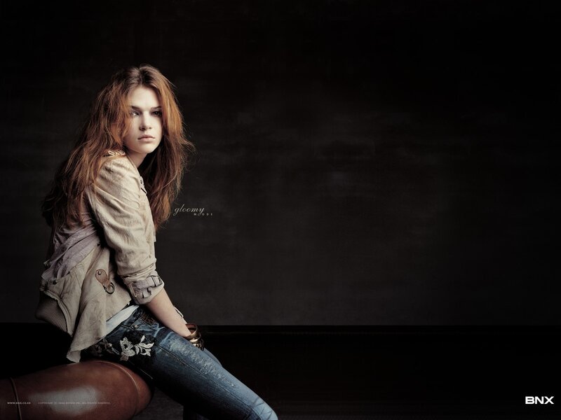 Woman Sitting on Leather