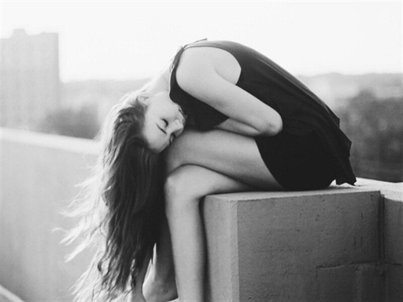 Woman Sitting on Ledge — Black, Melancholic