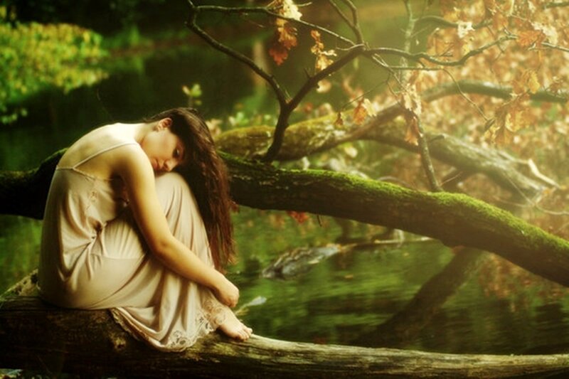 Woman Sitting on Log — Green