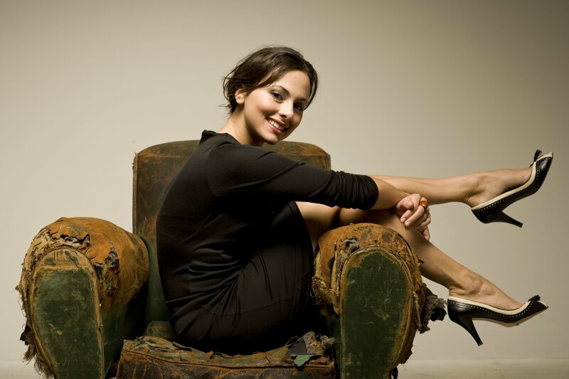 woman sitting on old chair