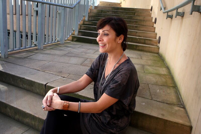 woman sitting on outdoor steps