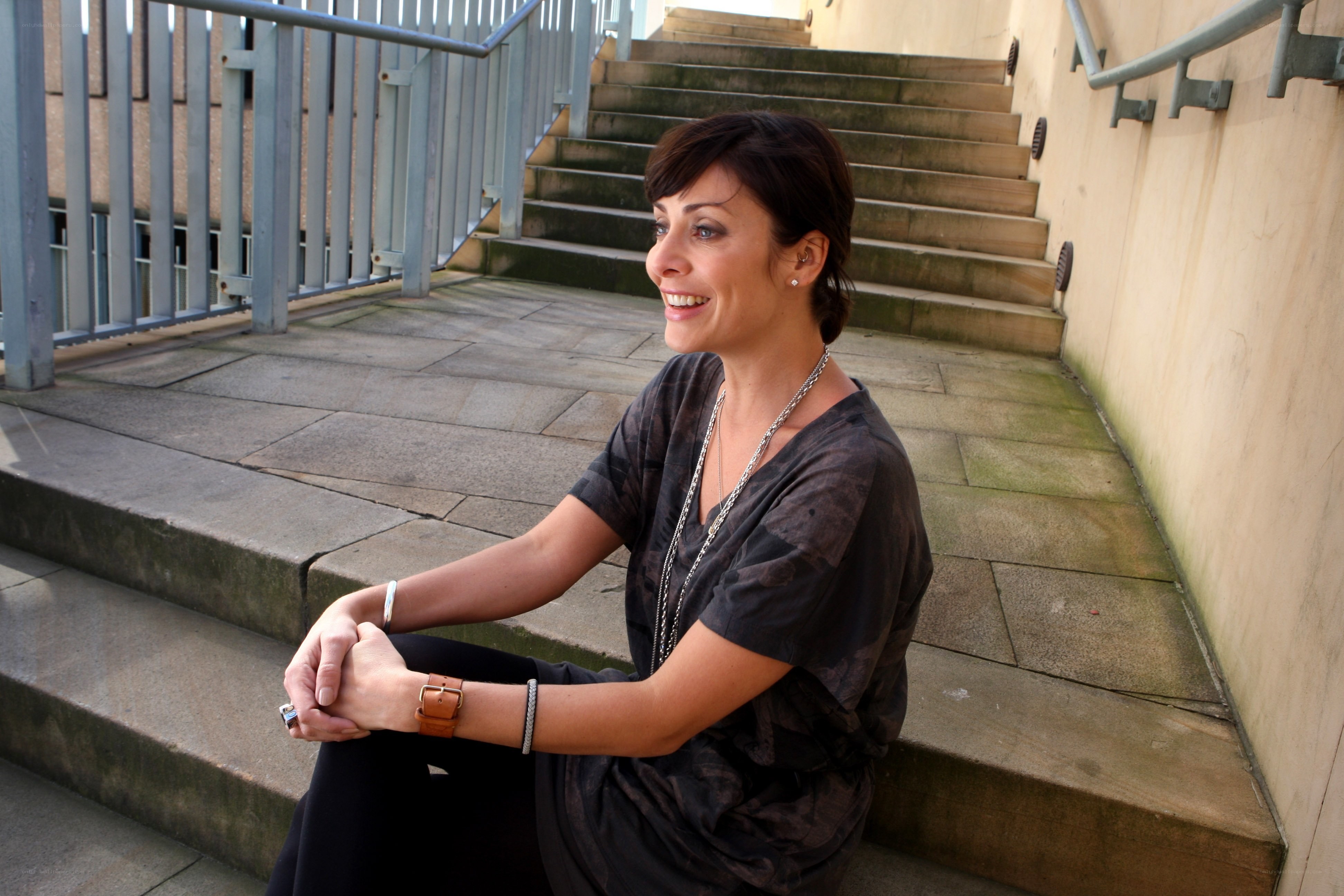 woman sitting on outdoor steps