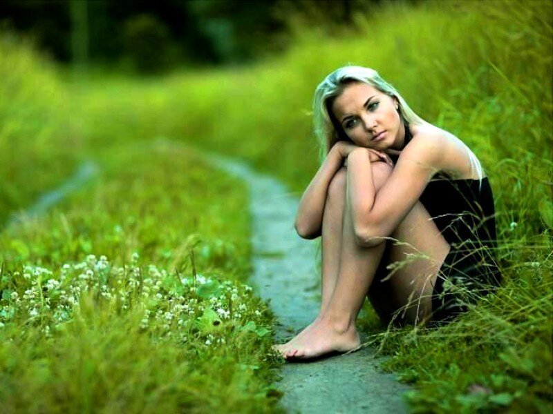 Woman Sitting on Path — Green, Contemplative