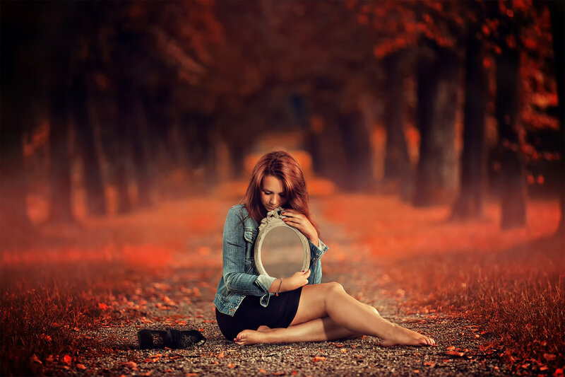 Woman Sitting on Path — Red