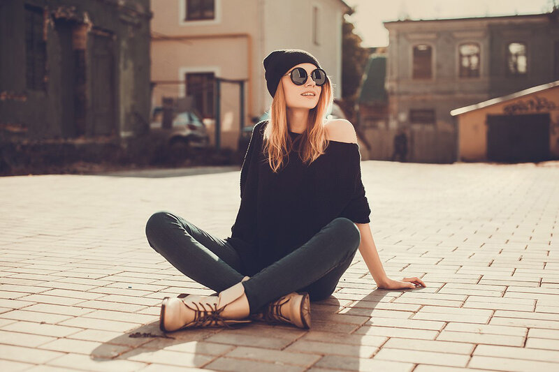 Woman Sitting on Pavement — Black, Relaxed